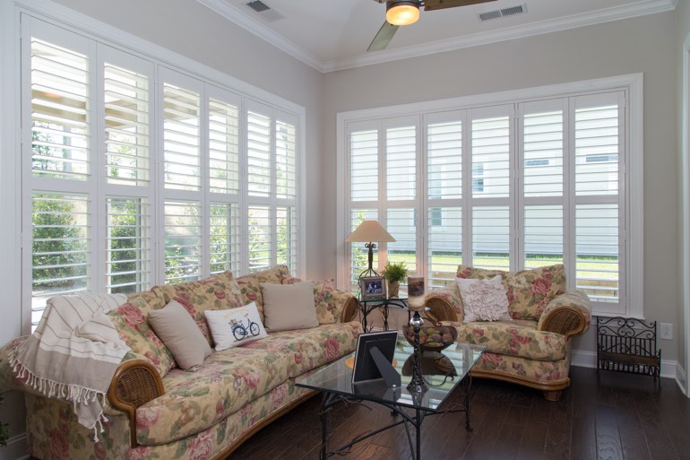 Sunroom with interior shutters in Boise.